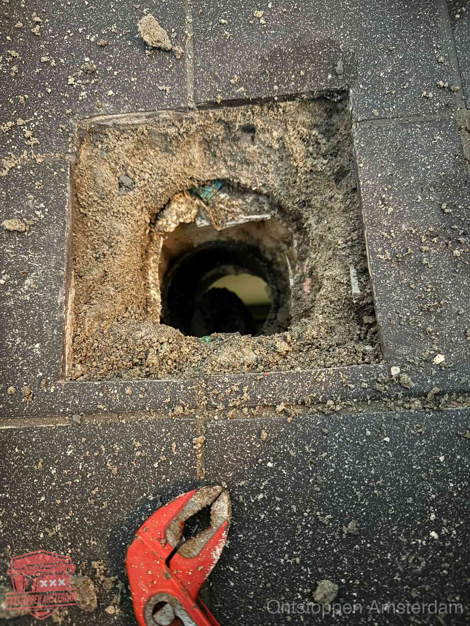 Rioolputje erfgrens eigendom in Amsterdam